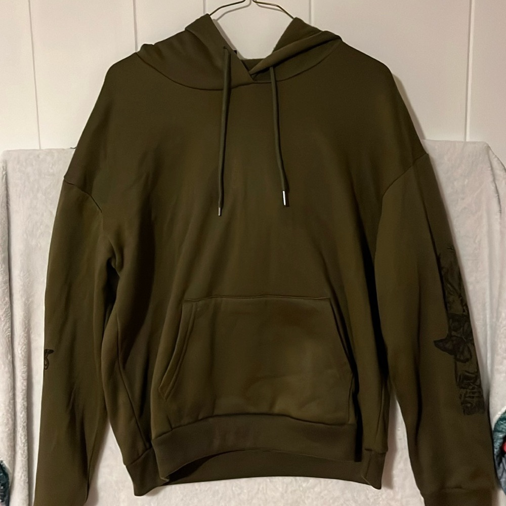 Dark, muted green hoodie. Grunge, butterfly design on back. Wool lined.